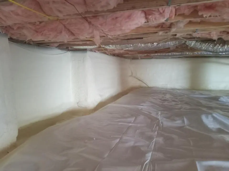 Crawl space encapsulation with closed-cell spray foam for Commercial Roof Restoration in Auburn